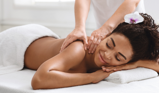 woman-relaxing-during-full-body-massage-1080x630